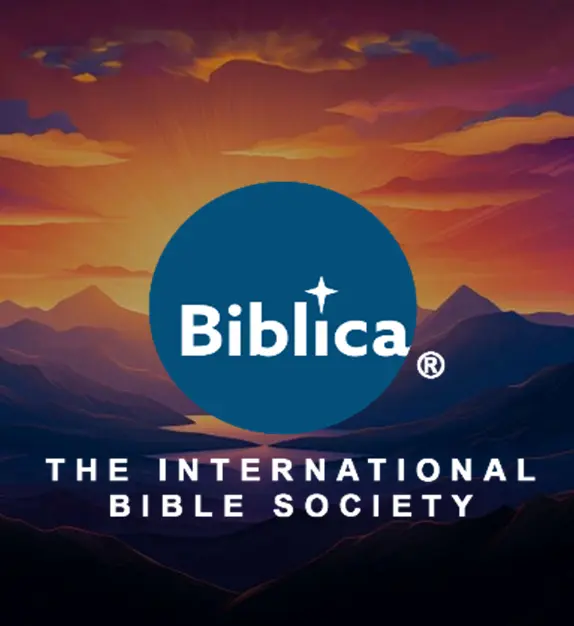 Biblica logo in front of an opening in mountains containing a lake.